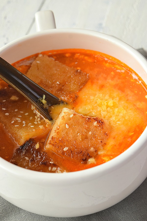 Close up of Easy Homemade Tomato Soup served with homemade sesame croutons 