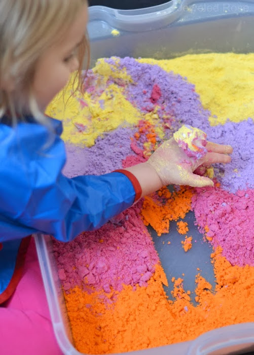 Make cloud dough in every color of the rainbow with this easy recipe for kids! #clouddough #clouddoughrecipe #coloredclouddough #rainbowclouddough #growingajeweledrose #activitiesforkids