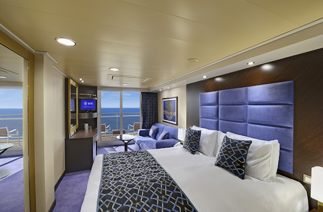 Cabine premium avec lit double pour la croisière Caraïbes.