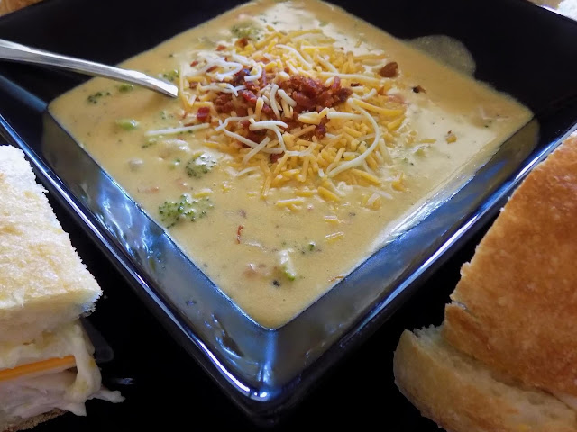 A picture of a bowl of freshly made Broccoli cheddar soup