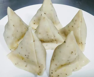 Filled and sealed Samosa pastry for Samosa recipe