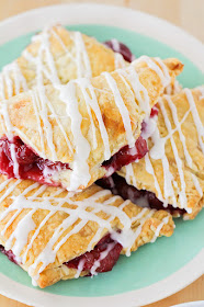 These flaky and sweet cherry turnovers are bursting with fresh cherries and drizzled with a sweet almond glaze. Perfect for breakfast, brunch, or dessert!