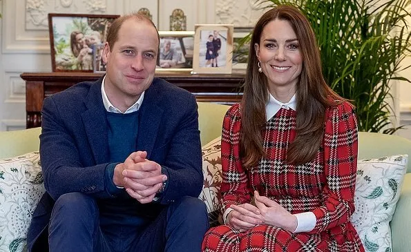 Kate Middleton wore red tartan pleated midi dress by Emilia Wickstead and pearl earrings from Simone Rocha