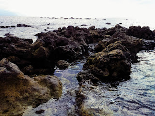 Natural Chunk Of Beach Rocks Onshore And Sea Water Flow Between In It At Umeanyar Village North Bali Indonesia