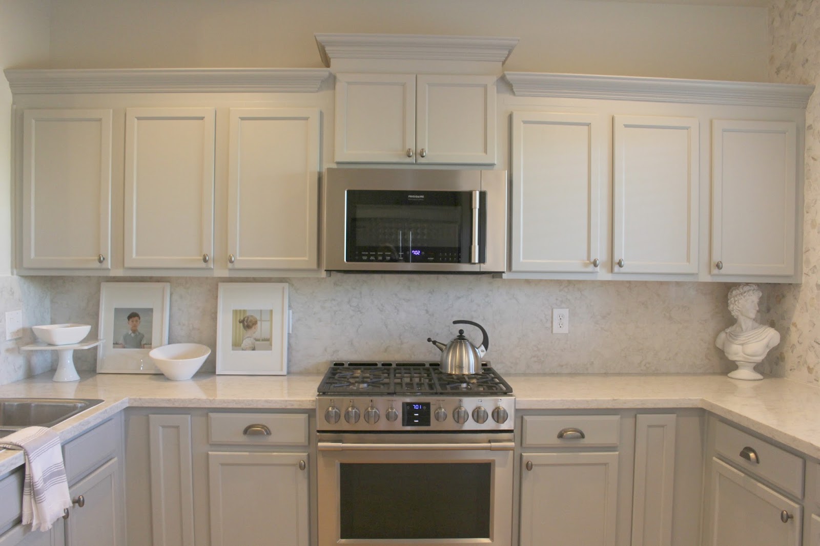 Serene Nordic French style kitchen renovation with pastels and grey cabinets by Hello Lovely studio