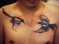 Birds On Chest Tattoo Meaning