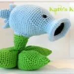 http://www.ravelry.com/patterns/library/plants-vs-zombies-snow-pea-shooter