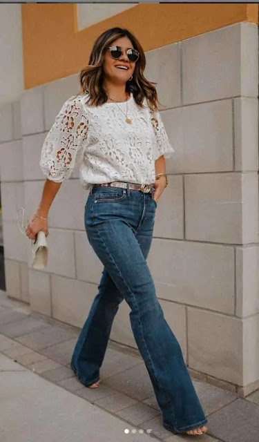 a lace top with flare jeans.
