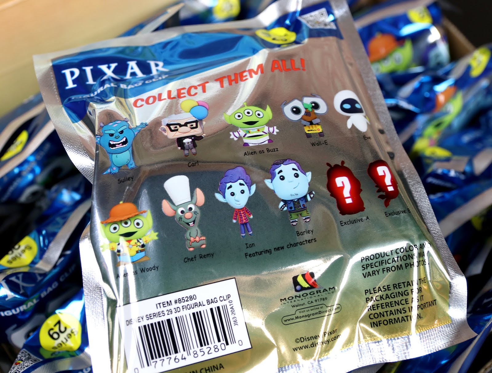 monogram figural bag clip blind bags pixar series 