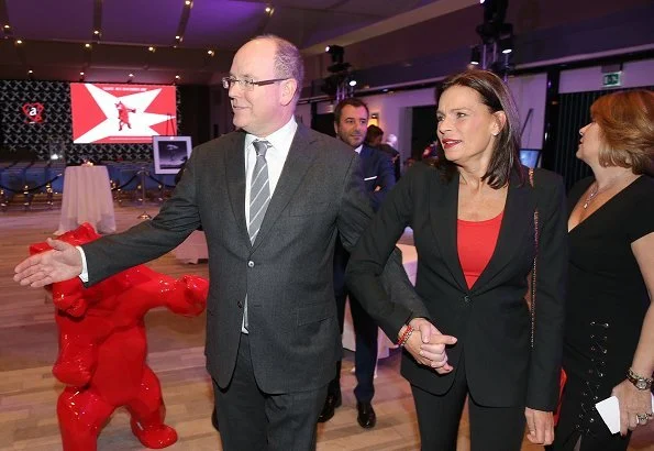 Princess Stephanie, Prince Albert, Camille Gottlieb and Louis Ducruet. Stephanie wore Chanel pantsuit and red top