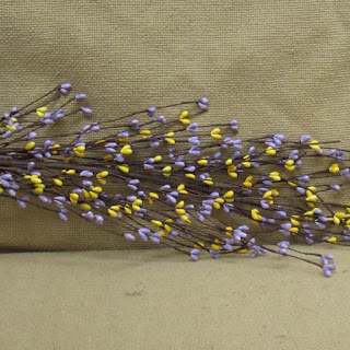http://www.outerbankscountrystore.com/pip-berry-garland-lavender-and-yellow/
