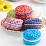 http://www.topcrochetpatterns.com/free-crochet-patterns/cute-macarons