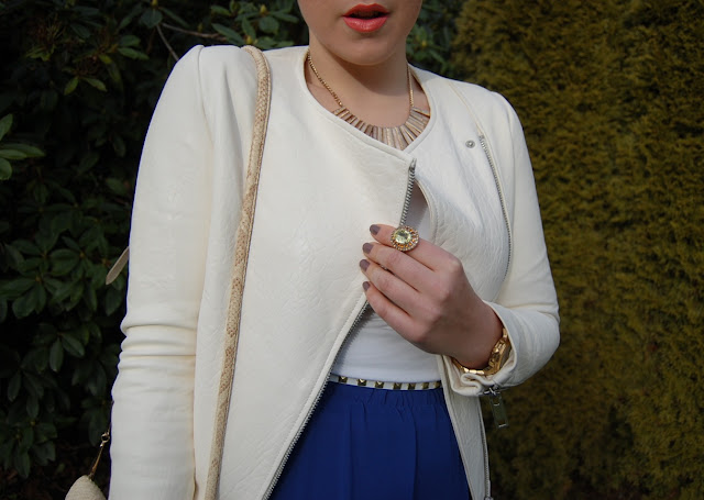 Zara white leather jacket, bright blue Forever 21 maxi skirt and a snakeskin Ferragamo bag.