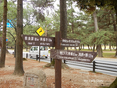 Nara street showing directions to the temples