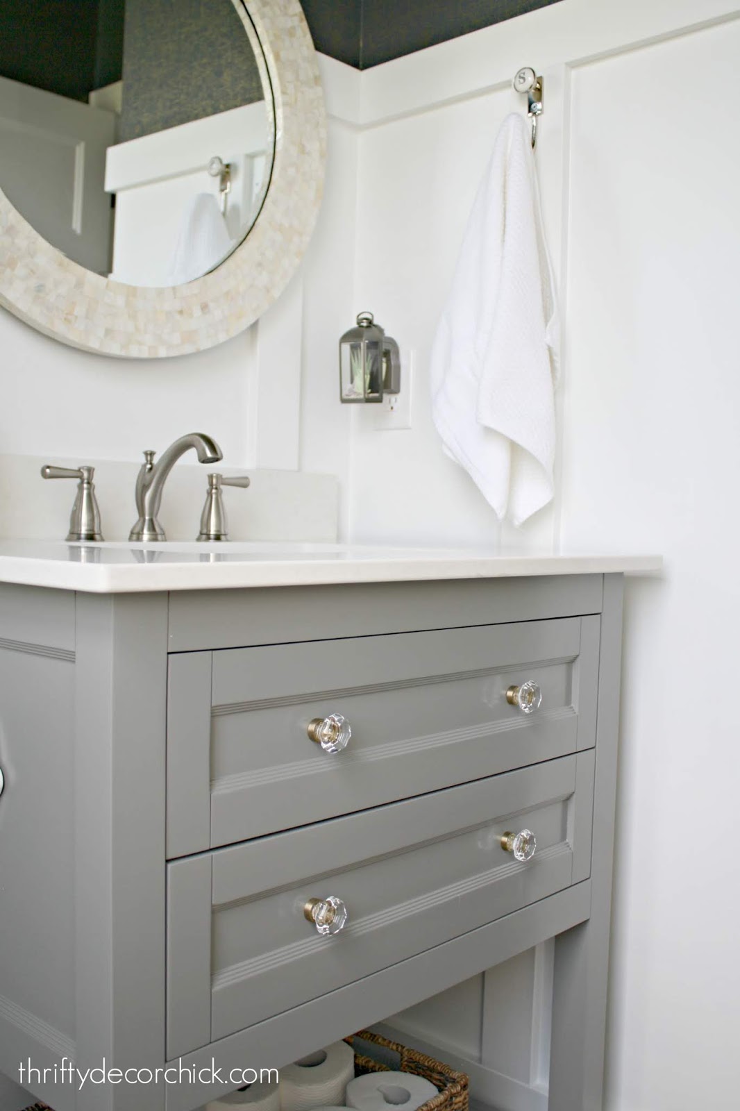 Glass knobs gray vanity round mirror bathroom