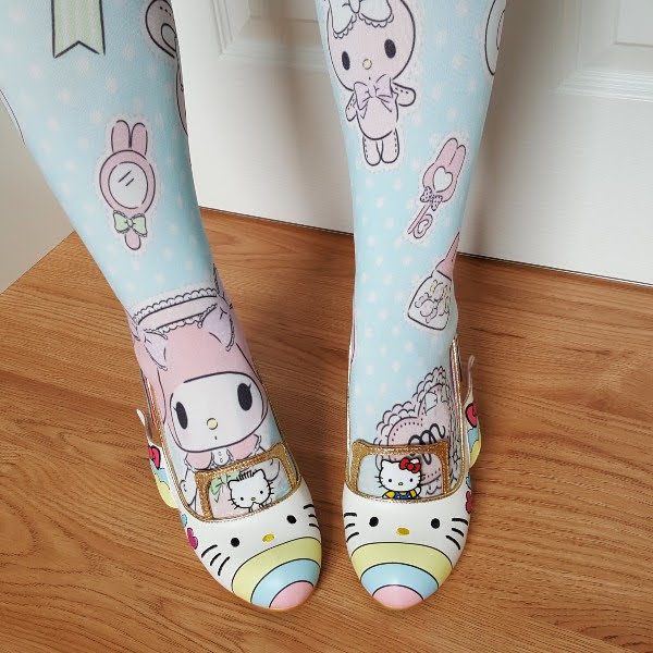 wearing Hello Kitty plane shoes with Sanrio pastel tights