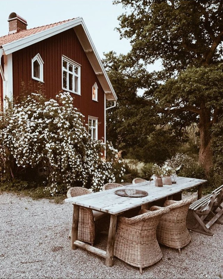 An Idyllic Red and White Swedish Farmhouse In The Countryside