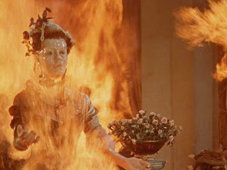 Wax sculpture on fire in House of Wax