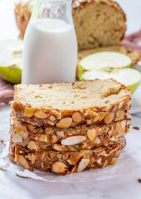 This delicious fall bread is packed with chunks of apples and topped with a delicious, buttery caramel almond mixture! Try it for breakfast, snack or dessert and enjoy every last bite!
