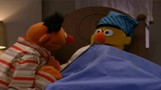 Bert wants to sleep. Ernie prefers watching Bert sleep instead of sleeping. Ernie sings a song about sleep. Sesame Street Bedtime with Elmo