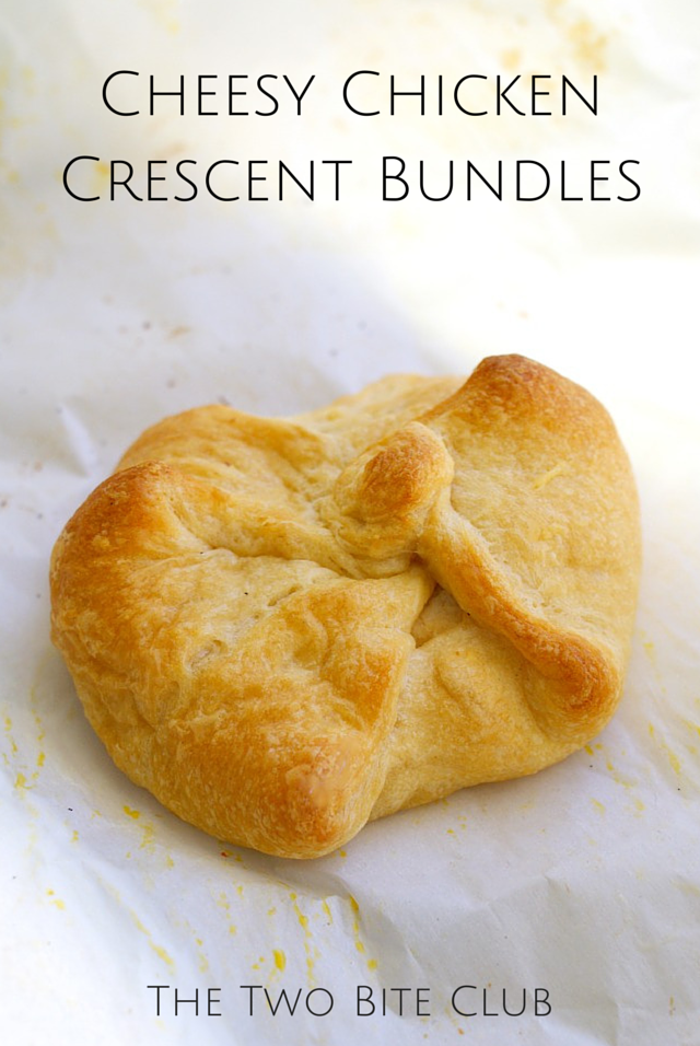 Cheesy Chicken Crescent Bundles are golden baked crescent rolls that are stuffed with a rich and garlicky chicken, parmesan, and cream cheese filling.