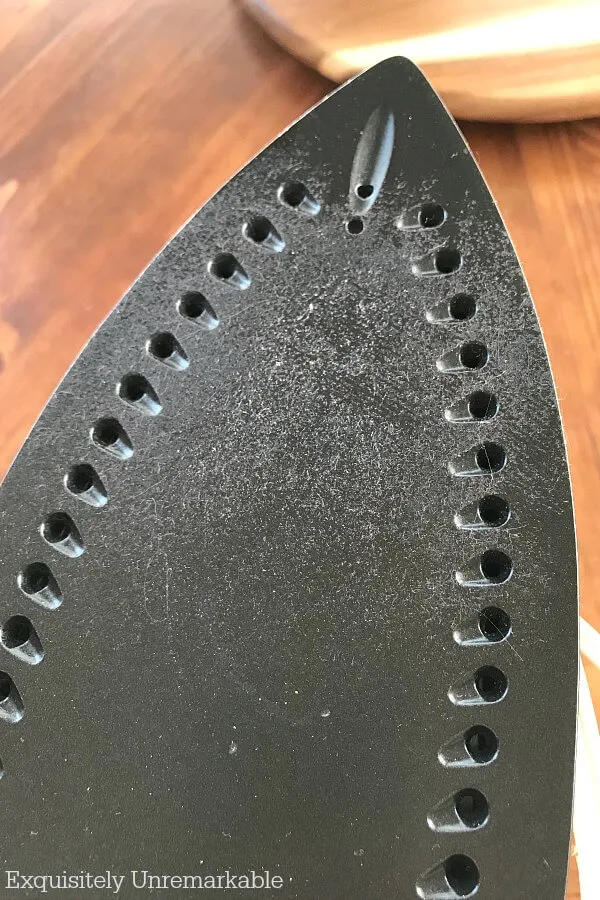  An Iron With A Melted, Sticky Mess