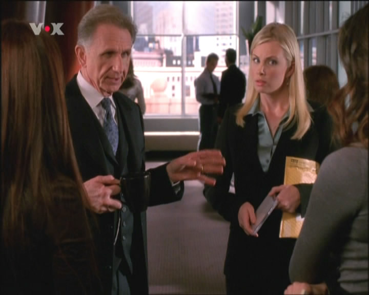 Ladies in Satin Blouses Monica Potter silver satin blouse under suit