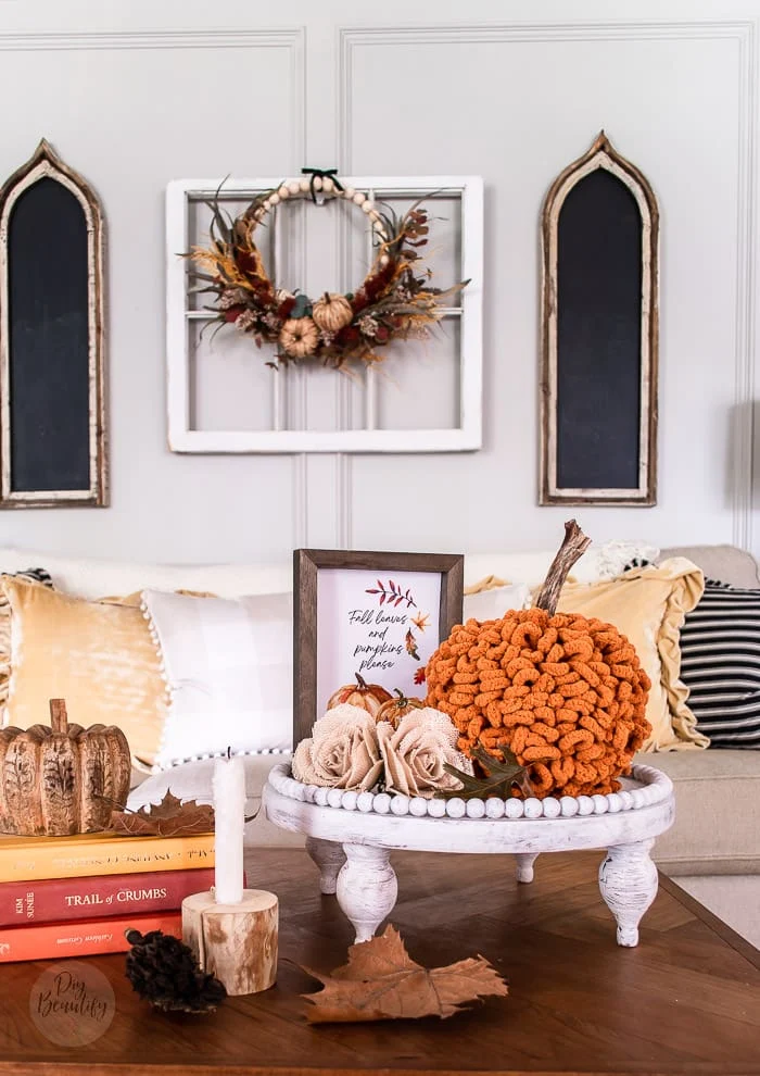 Fall wreath and chalkboards, coffee table Fall vignette with pumpkins, books, candles and dried leaves