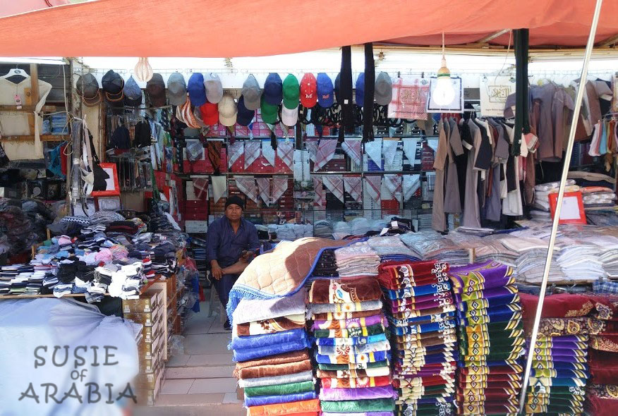 Jeddah Daily Photo Caps, Scarves, and Prayer Rugs