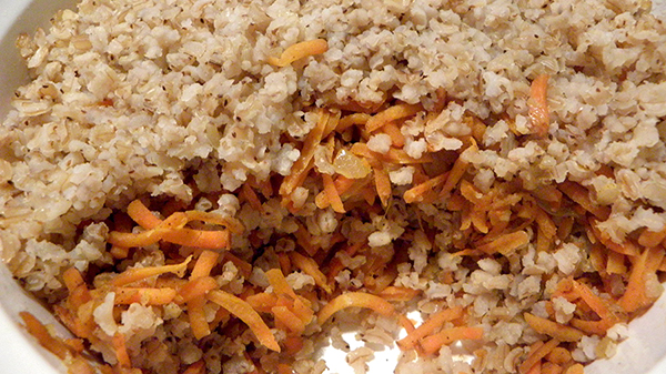 closeup of the toasted brown rice & carrot pilaf served
