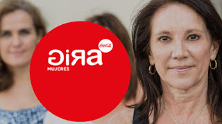 Gira mujeres Se ven tres mujeres y delante de ellas el logotipo del proyecto (es un círculo rojo con las palabras gira al revés y el símbolo de Coca-cola)