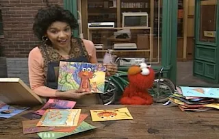 Maria chooses the picture that she like most. Maria asks Elmo how he can draw these good pictures. Sesame Street The Best of Elmo