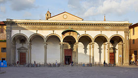 The loggia facade of the Basilica della Santissima  Annunziata in Florence, where Carucci was buried