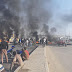 الحلبوسي يتحدي العراقيين والمتظاهرون يدهسون صوره تحت الأقدام