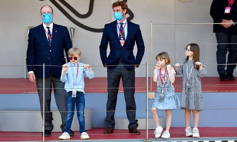 Princess Gabriella wore a blue denim daisy duck dress from Monnalisa. Prince Jacques, Pierre Casiraghi and Kaia Rose Wittstock