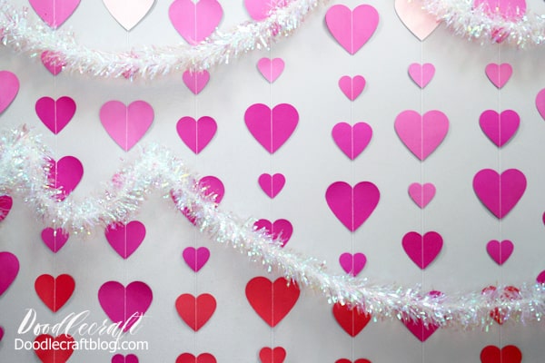 Dangling heart wall back ground is the perfect addition to any Valentine's day decor.