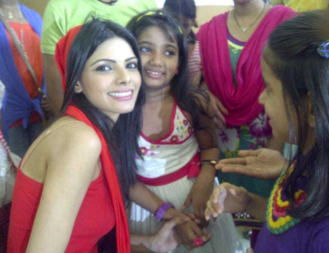 Sherlyn Chopra christmas celebration photos, Sherlyn Chopra in red dress