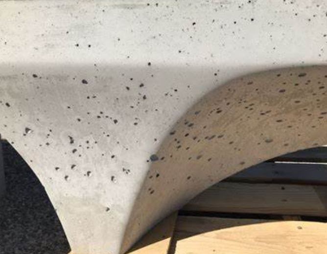 What Causes Holes in Concrete? Bugholes