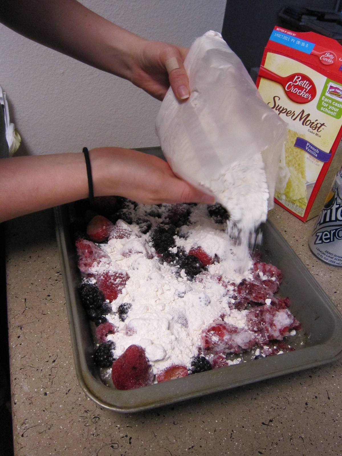 Add dry cake mix over the top. The recipe calls for a white cake mix ...