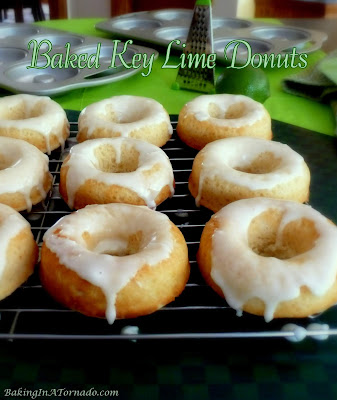 Baked Key Lime Donuts have a refreshing citrus flavor. Bake, glaze and enjoy!| Recipe developed by www.BakingInATornado.com | #recipe #donuts