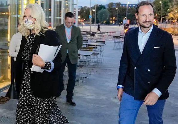 Crown Princess Mette-Marit wore a birds-flying print midi dress by Pia Tjelta. Crown Prince Haakon accompanied Crown Princess Mette-Marit