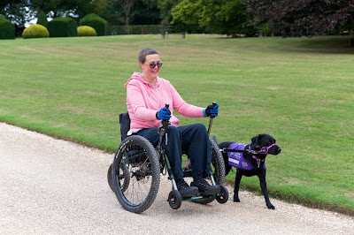 Photo of me taking the dog for a walk with my mountain trike
