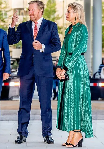 Queen Maxima wore a green Atlantis geometric-jacquard silk-blend dress from Zeus+Dione, and black sandals from Gianvito Rossi