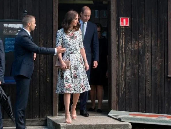 Kate Middleton wore Erdem Imari Hurst Rose Skirt. Catherine, Duchess of Cambridge, Prince William visit Nazi Concentration Camp