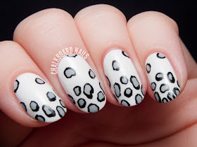 Giant leopard moth nail art by @chalkboardnails