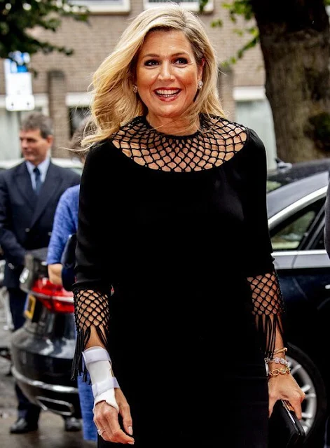 Queen Maxima wore a fringed macrame-paneled silk-crepe midi dress by Valentino. Valentino Spring Summer 2016 collection