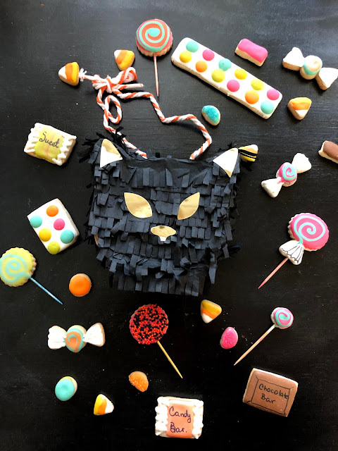 DIY Halloween party, DIY piñata, Piñata, treat bags,halloween treats,paper crafts,party favors ideas, Halloween crafts, cookie decorating, decorated cookies, cookie decorating videos, Halloween cookies,