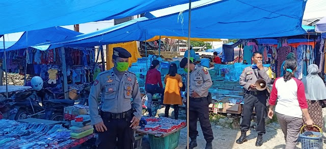 Sat Sabhara Polres Luwu Utara Beri Himbauan di Pasar Sabbang Untuk Menjaga Penularan Covid- 19