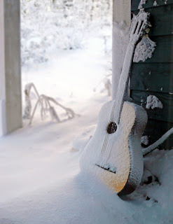 snow covered guitar