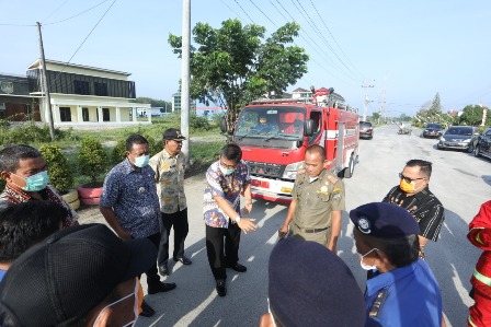 Asisten Perekonomian dan Pembangunan lakukan penyemprotan Disinfektan Kota Kisaran.